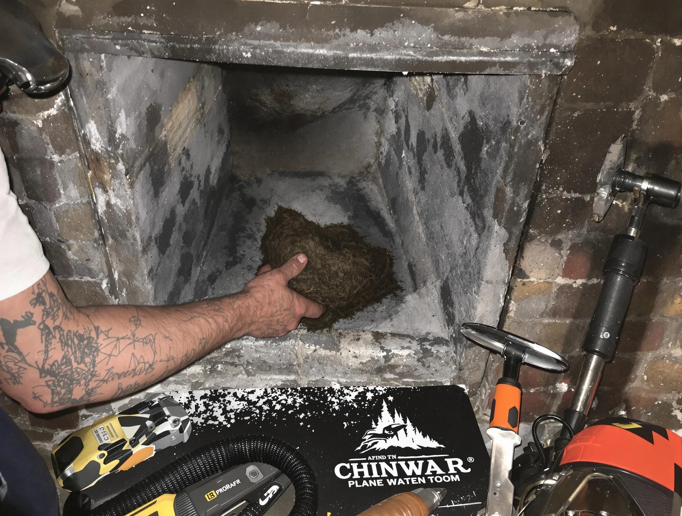 Brighton Chimney Sweep safely removing debris and screening chimney in Brighton, PA