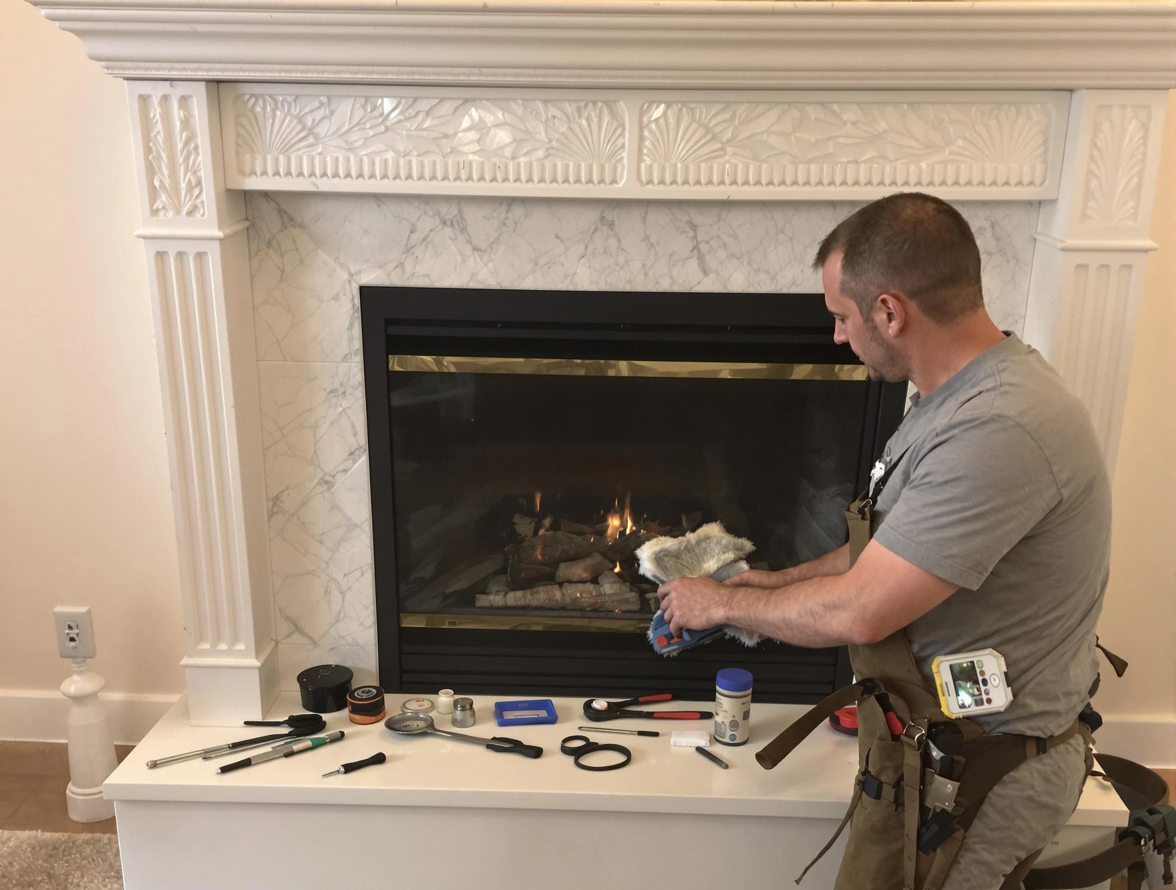 Brighton Chimney Sweep performing fireplace maintenance in Brighton, PA